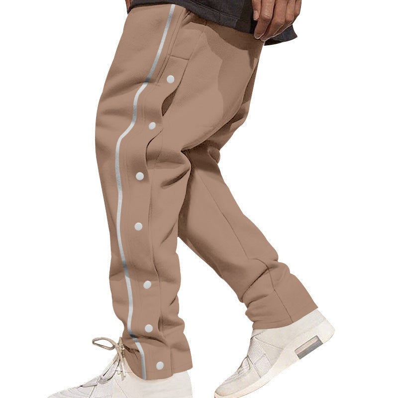 Herren nan weite Trackpants mit seitlicher Druckknopfleiste, elastischem Bund und reflektierendem Streamline-Streifen Drune