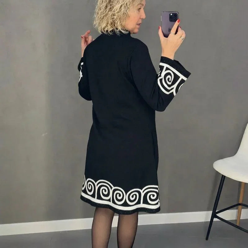 Iris™ Midikleid mit Mäander-Saum und ornamentierten Manschetten